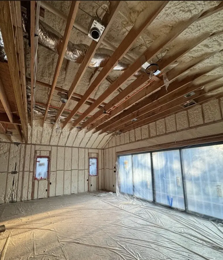 Interior walls and ceiling insulated with spray foam during new construction in Chillum